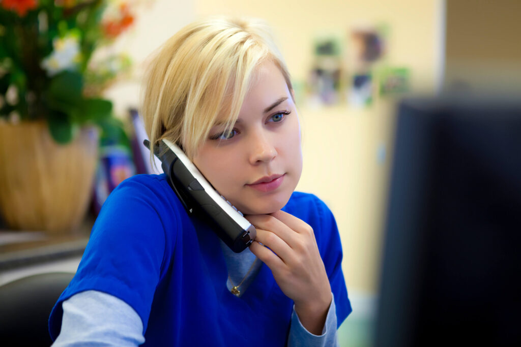 Vet on Phone with Client